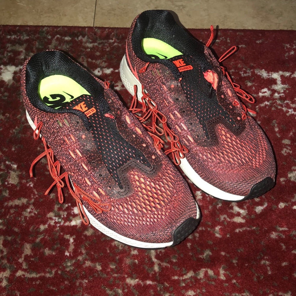 Nike orange running shoes